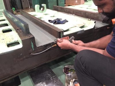 CNC machine Hand Scraping and Turcite Fixing 8